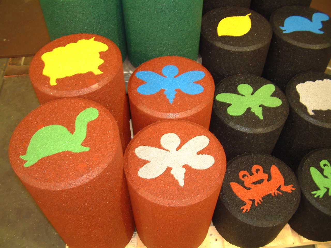 Character, number and letter inserts moulded into the surfaces of Playtiles.